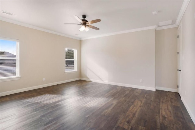 unfurnished room with dark wood-type flooring, ornamental molding, baseboards, and ceiling fan