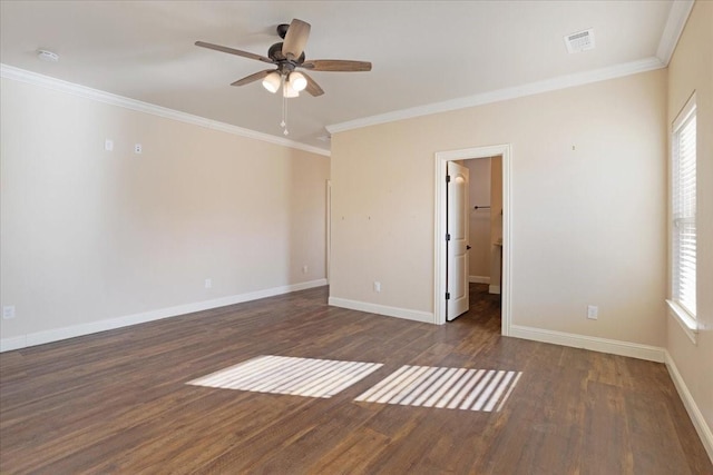 unfurnished room with ceiling fan, dark hardwood / wood-style flooring, and crown molding