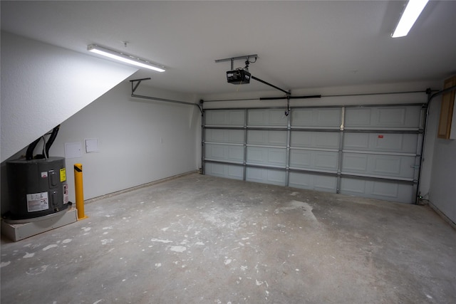 garage featuring a garage door opener and water heater