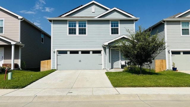 view of front facade with a garage and a front yard