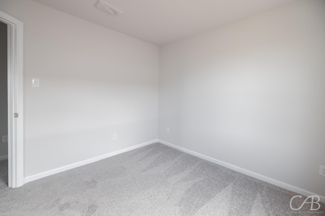 empty room with carpet floors