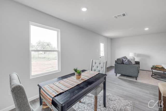 dining space featuring light hardwood / wood-style floors