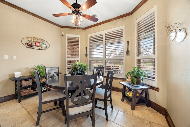 dining area with ceiling fan and ornamental molding