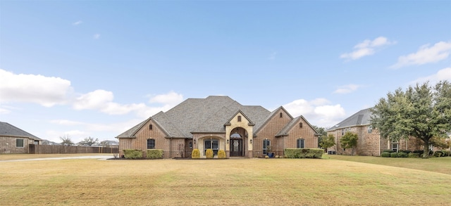 view of front facade with a front lawn