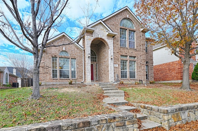 view of front property featuring central air condition unit