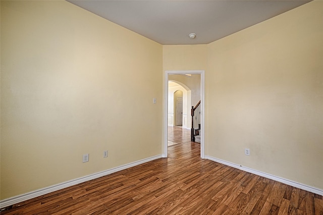 spare room with hardwood / wood-style flooring