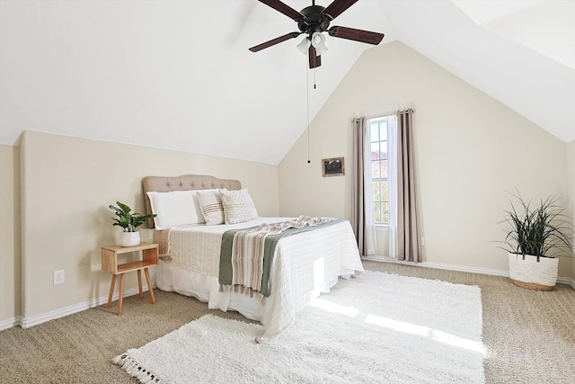 bedroom with ceiling fan, carpet floors, and lofted ceiling