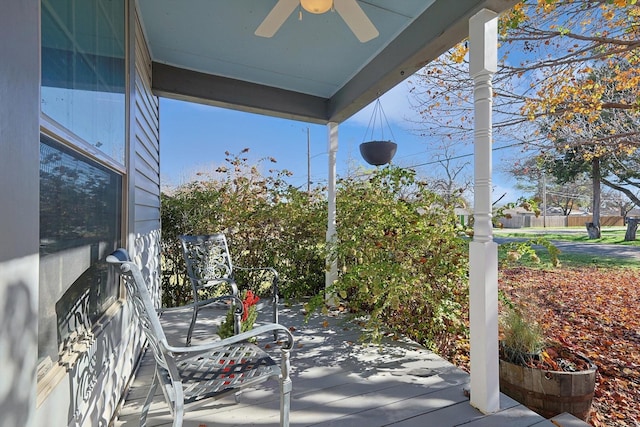 view of patio / terrace with ceiling fan and a porch