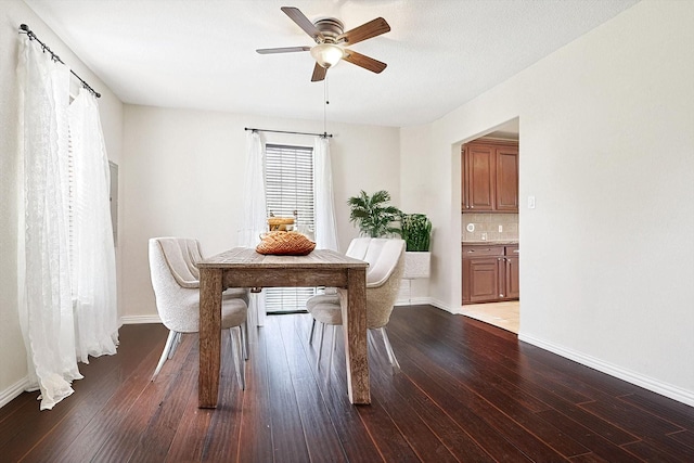 dining room featuring hardwood / wood-style flooring, ceiling fan, and a healthy amount of sunlight