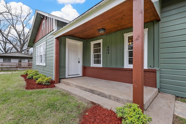 entrance to property with a porch