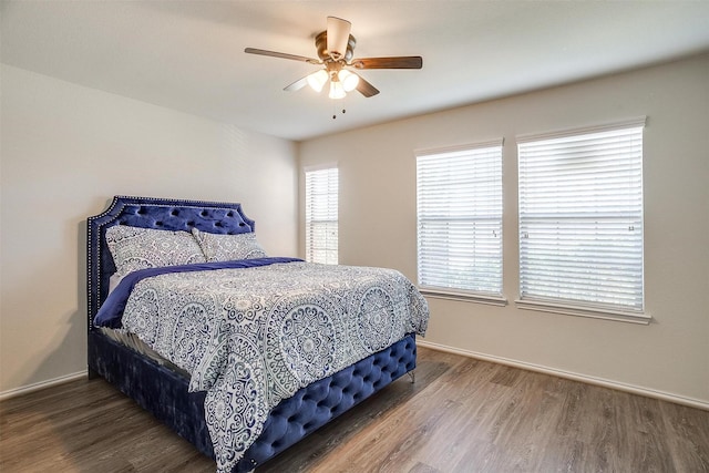 bedroom featuring ceiling fan and hardwood / wood-style floors