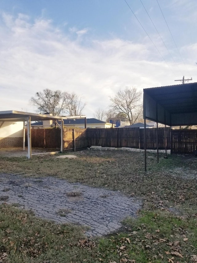 view of yard featuring a carport