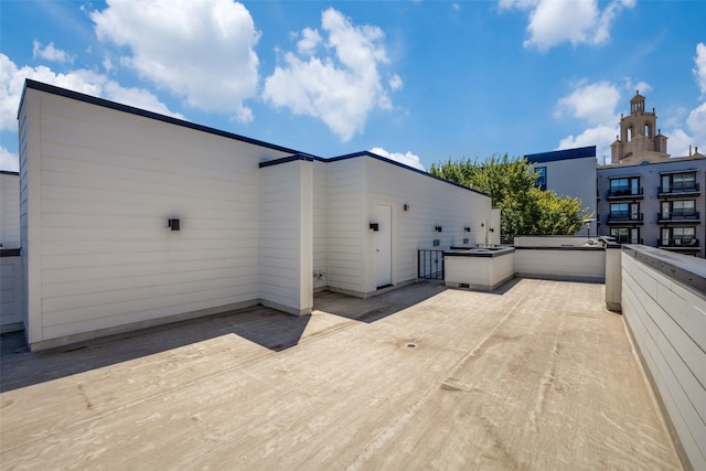 view of property exterior with a patio