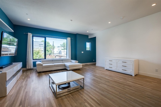 unfurnished living room featuring light hardwood / wood-style flooring