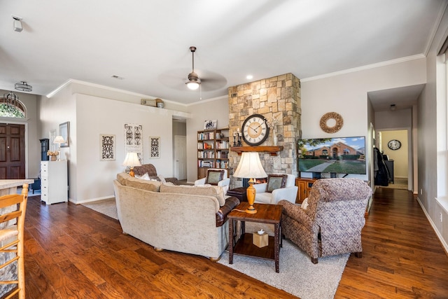 living room featuring dark hardwood / wood-style floors, ceiling fan, and ornamental molding