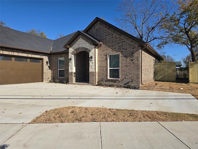 view of front of property featuring a garage