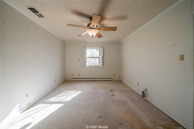 spare room with light carpet, visible vents, ornamental molding, baseboard heating, and a textured ceiling