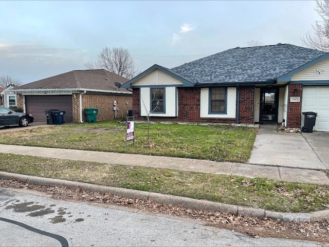 ranch-style house with a front lawn and a garage