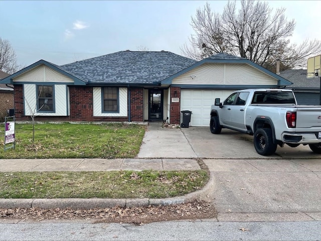 single story home with driveway, a shingled roof, an attached garage, a front lawn, and brick siding