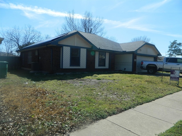 ranch-style home featuring a front yard