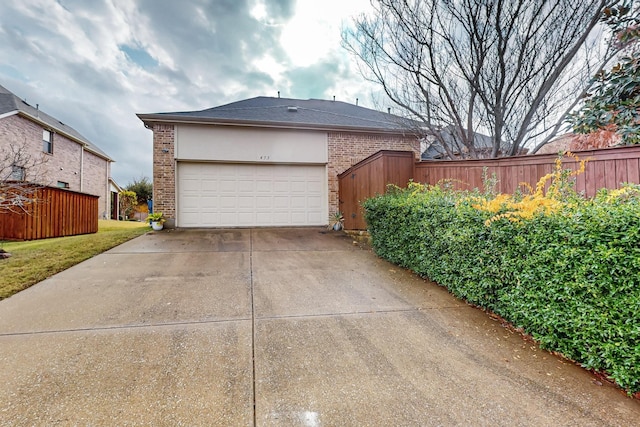 view of property exterior featuring a garage