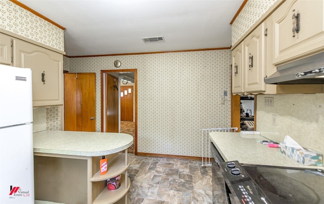 kitchen with ornamental molding, range, kitchen peninsula, and white fridge