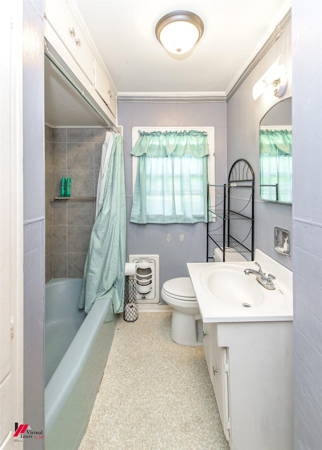 full bathroom featuring crown molding, plenty of natural light, toilet, and vanity