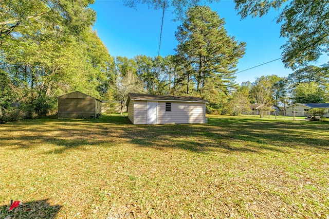 view of yard with a storage shed