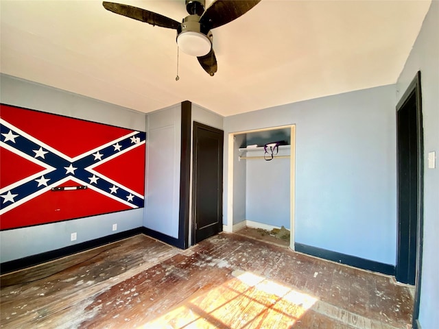 unfurnished bedroom with a closet and ceiling fan