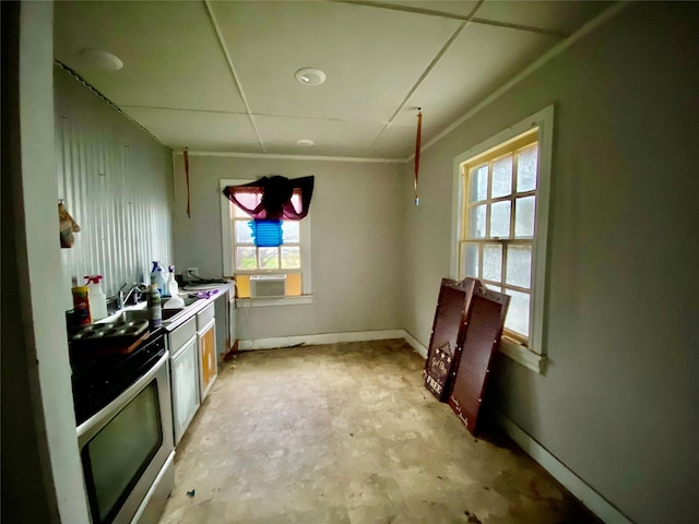 kitchen featuring electric range and cooling unit