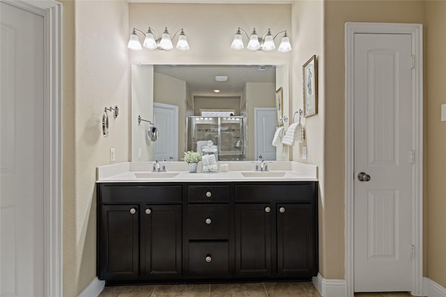 bathroom with vanity and an enclosed shower