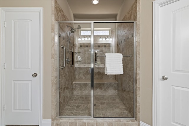 bathroom featuring walk in shower