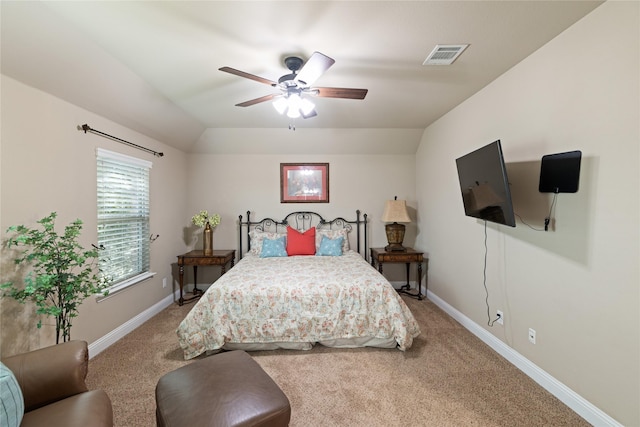 carpeted bedroom featuring ceiling fan and lofted ceiling