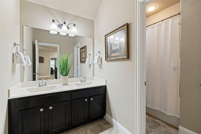 bathroom featuring vanity and walk in shower