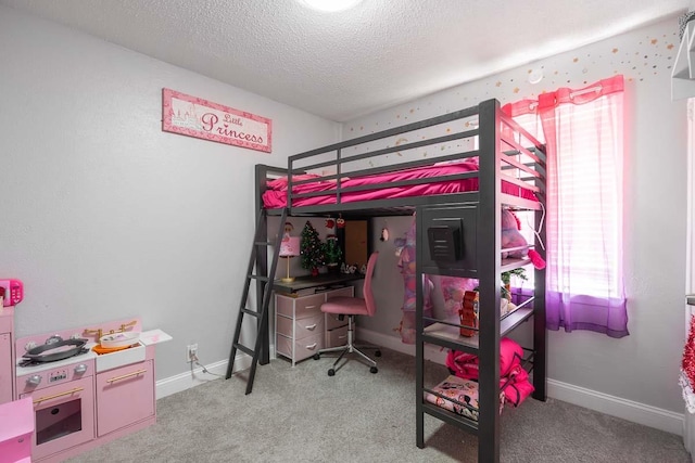 carpeted bedroom featuring a textured ceiling