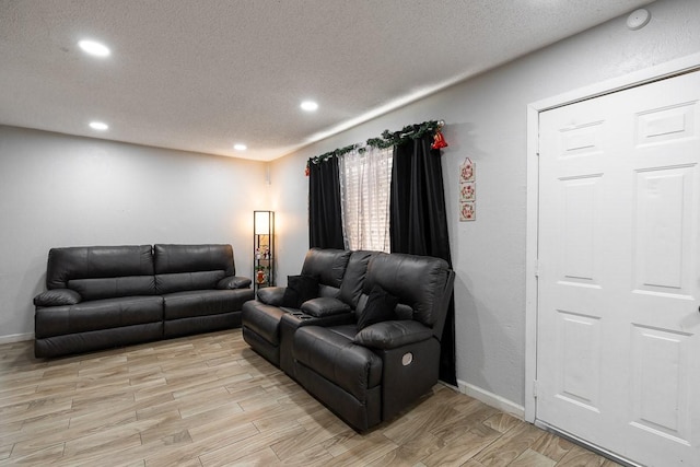 living room featuring a textured ceiling