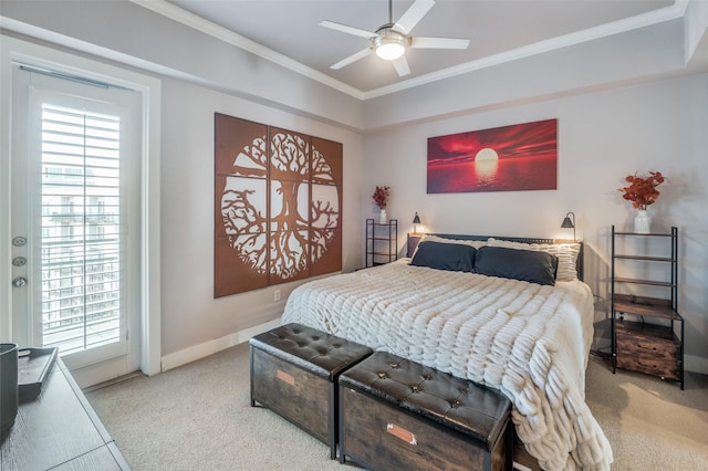 carpeted bedroom featuring ceiling fan and ornamental molding