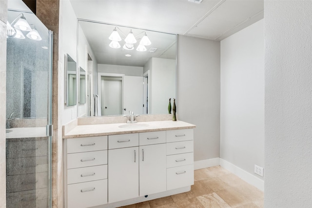 bathroom with vanity and walk in shower