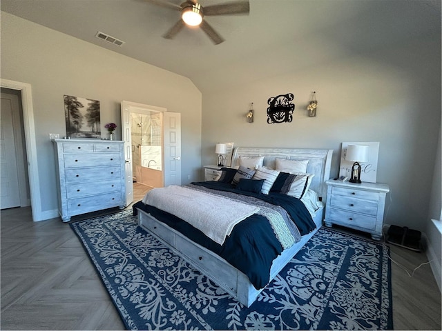 bedroom with ceiling fan, parquet floors, ensuite bathroom, and lofted ceiling