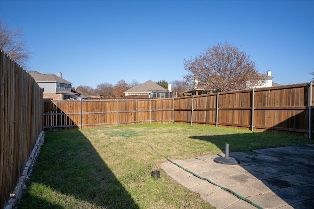 view of yard with a patio area