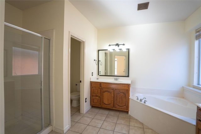 full bathroom featuring tile patterned floors, vanity, separate shower and tub, and toilet