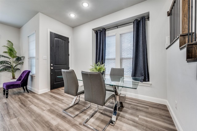 dining space featuring light hardwood / wood-style floors