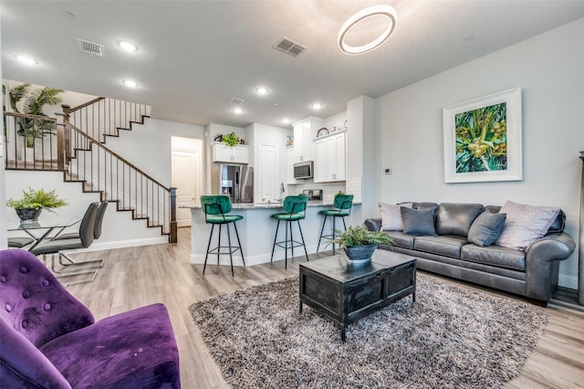 living room featuring light hardwood / wood-style flooring