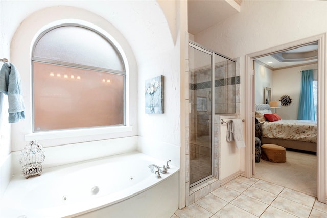 bathroom featuring tile patterned floors, a tray ceiling, ornamental molding, and shower with separate bathtub