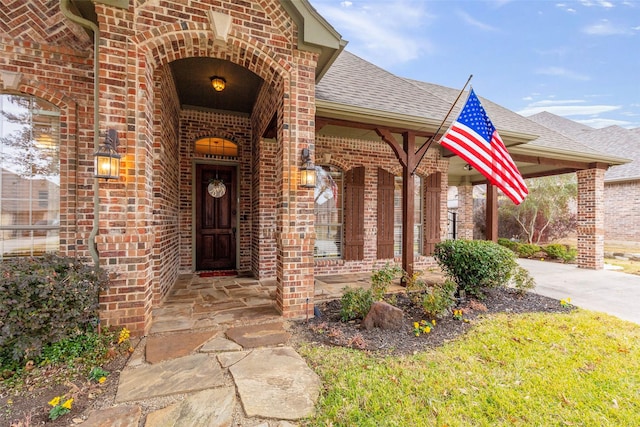 entrance to property with covered porch