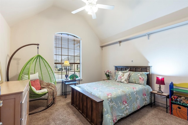 carpeted bedroom featuring vaulted ceiling and ceiling fan