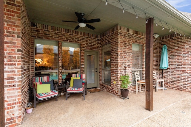 view of patio featuring ceiling fan