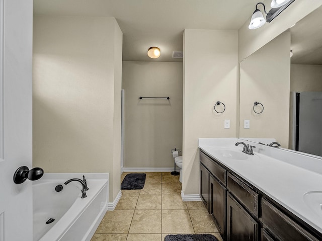 full bath with baseboards, toilet, a bath, tile patterned flooring, and a sink