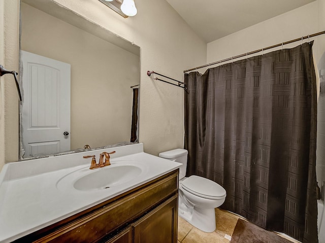 bathroom featuring toilet, tile patterned floors, a shower with shower curtain, and vanity