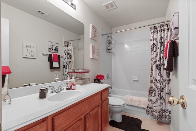 full bathroom featuring vanity, toilet, and shower / tub combo